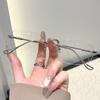 High-End Women's Rimless Blue Light Blocking Glasses - Fashionable Square Frame with Decorative Cut-Edge Design.