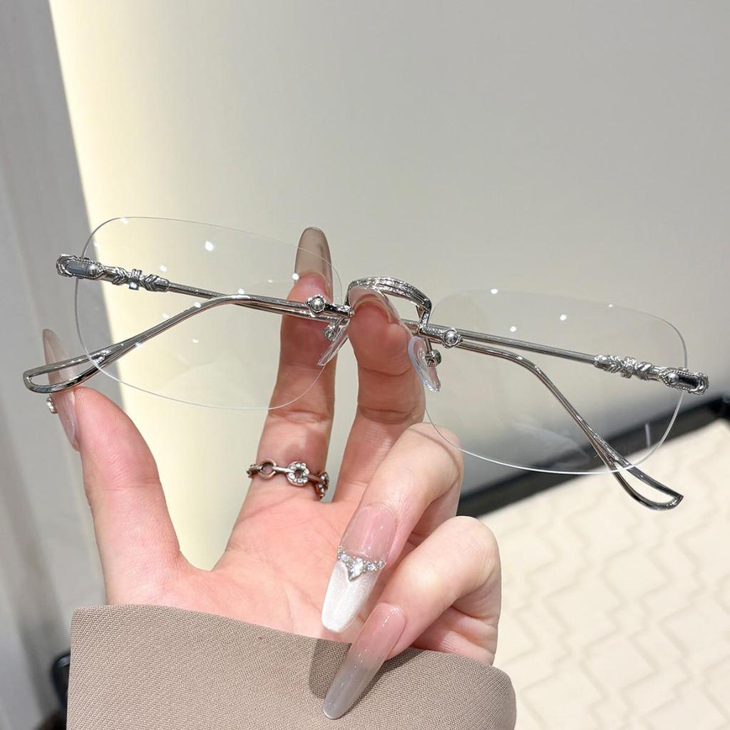 High-End Women's Rimless Blue Light Blocking Glasses - Fashionable Square Frame with Decorative Cut-Edge Design.