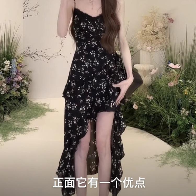 Irregular floral suspender dress for women's spring and summer new waist and thin black lotus leaf edge printed medium and long skirt