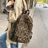 Leopard Print Backpack Casual Daily Use Trendy Street Style Lightweight Backpack for Women with Tassel Detail for School Travel and Everyday Outings