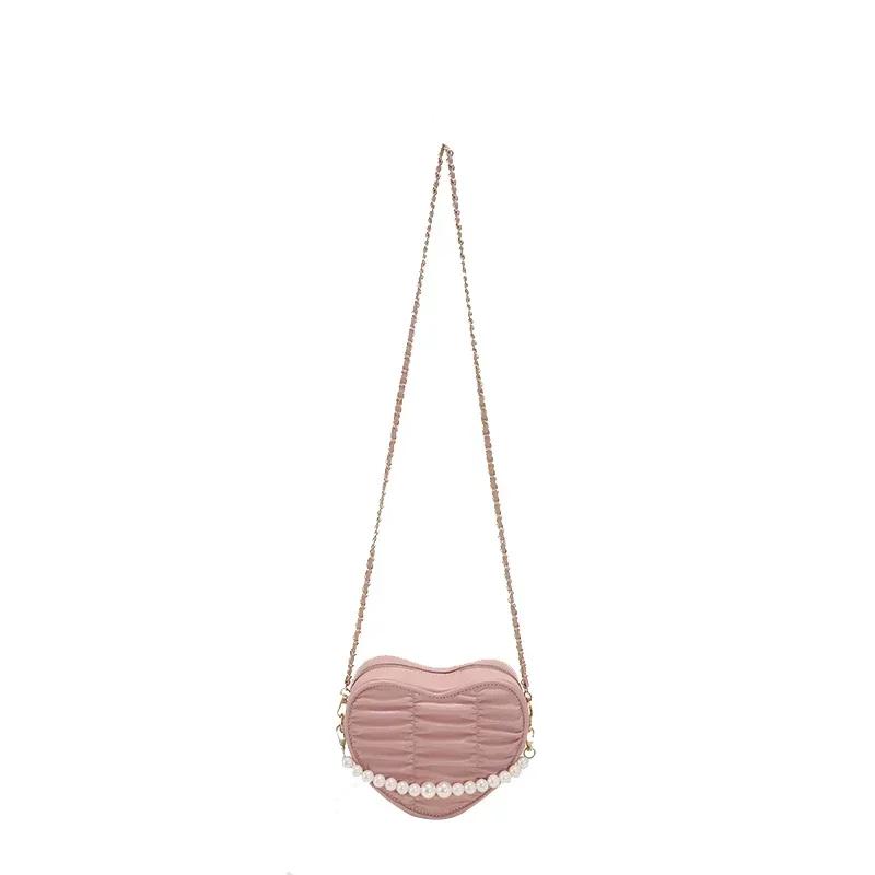 Heart-shaped solid chains shoulder bags classic fashion style sense of luxury popularity crossbody bags