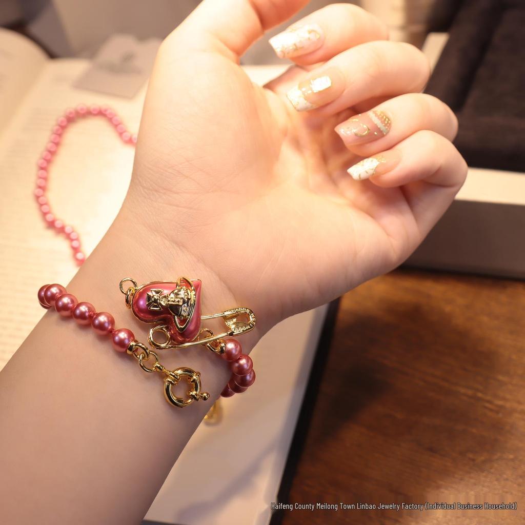 Kaiserinwitwe Pearl Heart Vivienne Orb Schlüsselbeinkette