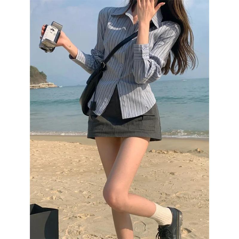 

Женские корейские полосатые рубашки с воротником-поло, женская новая рубашка, обтягивающая талию, утягивающий дизайн, универсальный топ, блузка с длинными рукавами S синий