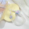 Stilvolles Handy-Lanyard mit Schmetterling & Blume: Perlenkette, Anti-Verlust-Seil, Niedlicher Anhänger für Damen
