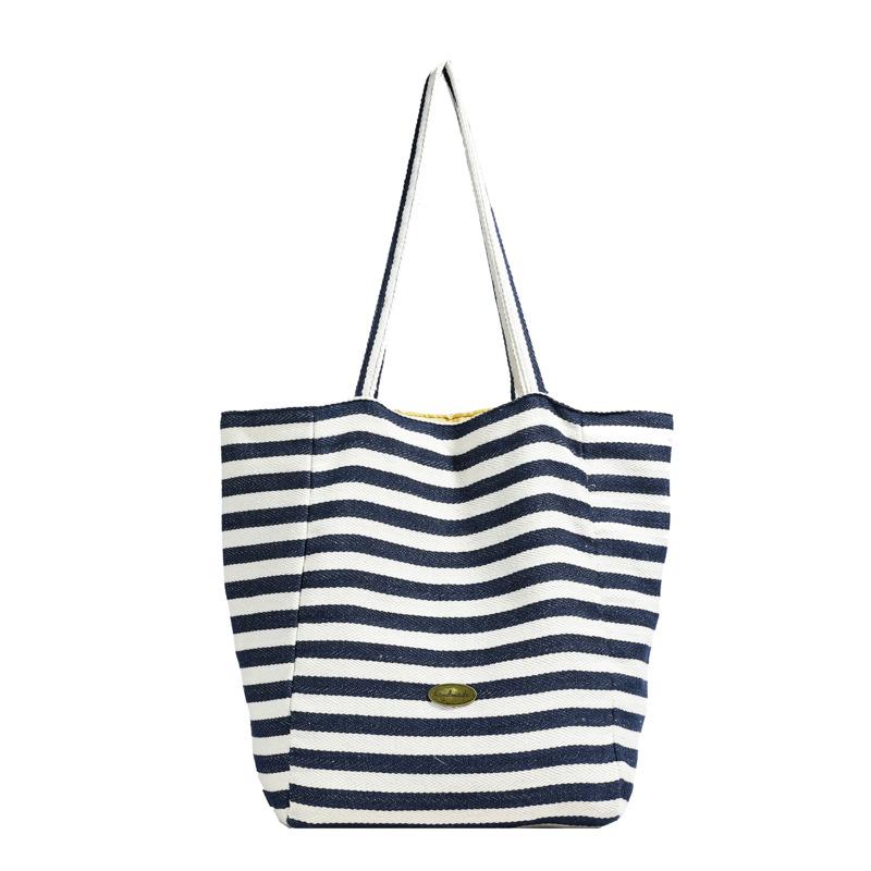 

Personalized striped wear-resistant canvas bag 2024 new Korean style ins leisure bag fashionable large-capacity shoulder tote bag синій