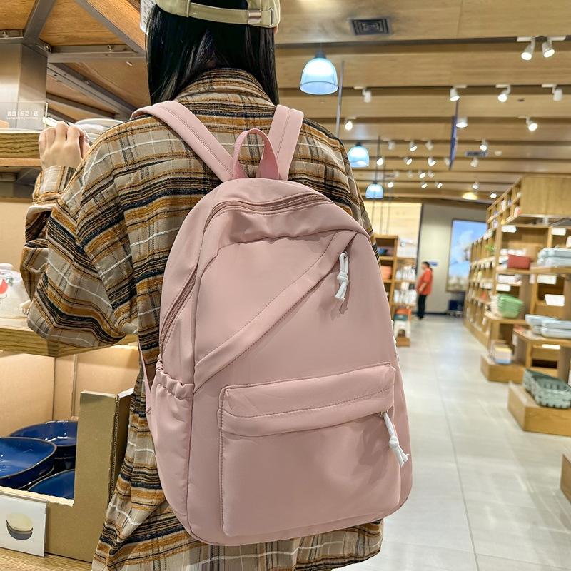 Schoolbag Classic Junior high school schoolbag for women, niche design sense, student backpack for girls, simple casual backpack for men