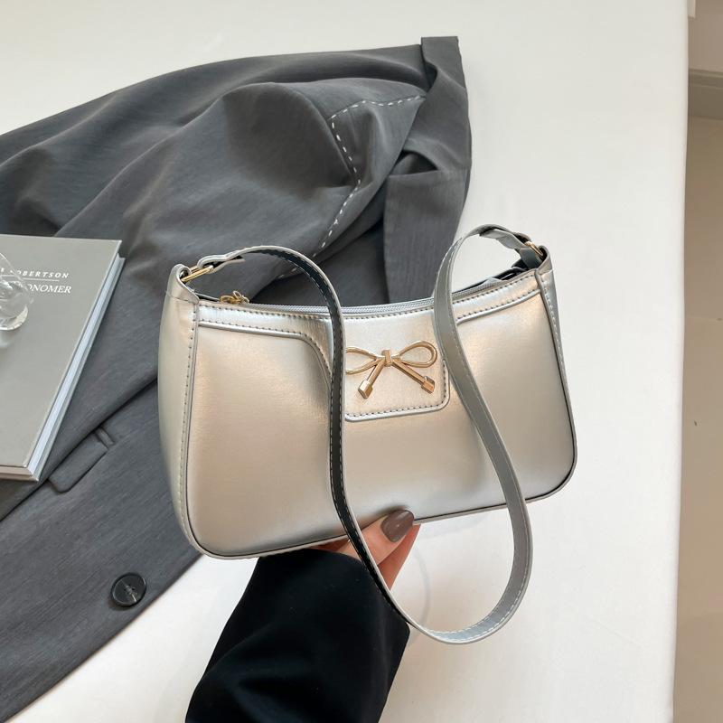Fashion bow 2025 solid color new Korean version trendy texture foreign style commuting single shoulder underarm baguette bag women