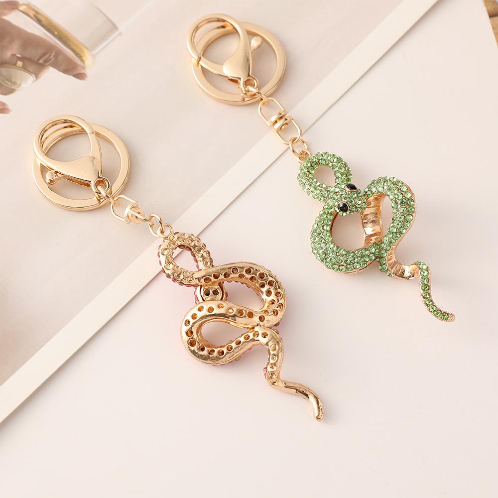 Sternzeichen-Serie Metall-Diamant-Schlüsselanhänger Schlangen-Anhänger Exquisiter Taschenanhänger Kleines Geschenk