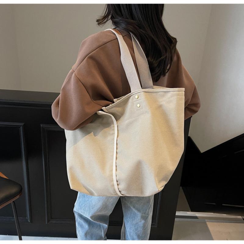 Simple literary tote bag women's spring new large-capacity shoulder bag commuter versatile underarm bag