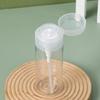 2 clear pump bottle dispensers press-down reusable travel bottle set for makeup, nail polish cleaning, cosmetics storage.