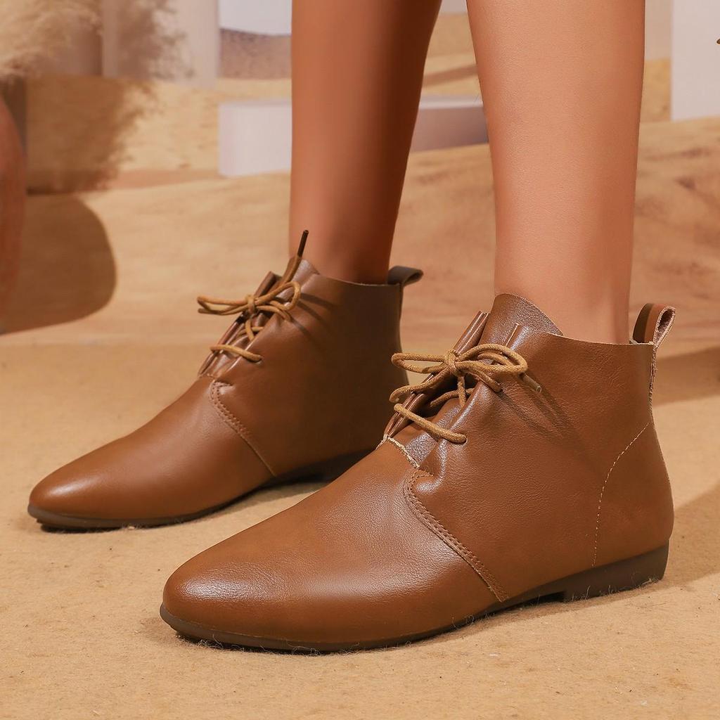 Women's Retro Pointed Toe Lace-Up Flat Ankle Boots, Soft Leather, Versatile Martin Style for Spring 2025.