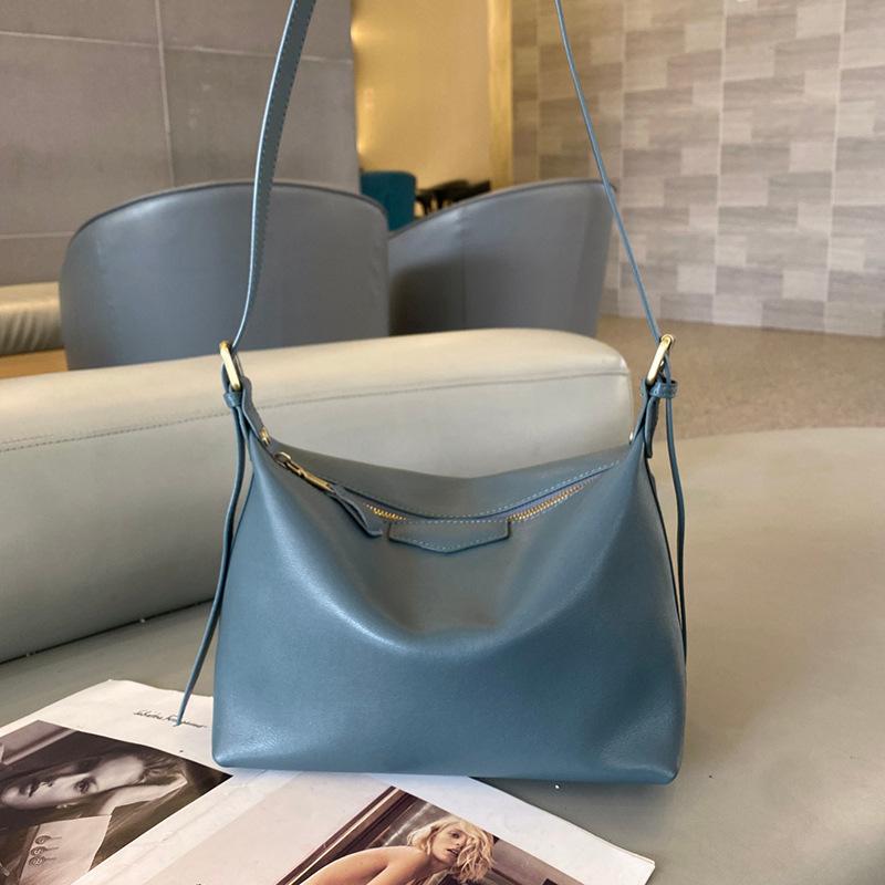 

Baby Girl 2025 New Style Top Layer Cowhide Breathable Hundred-Match Tote Bag High-Grade Real Leather Single Handle Wooden Handle Bag 26x13x21cm синий