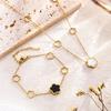 Black & White Double-Sided Four-Leaf Clover Set: Titanium Steel Necklace, Bracelet & Earrings for Women - Fashionable Plum Blossom Design