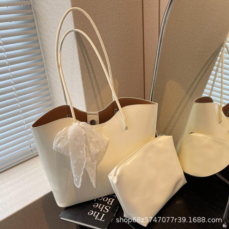 Foreign style simple urban commuting large capacity portable tote bag women's new high-end casual shoulder armpit bag