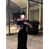 black one-word neck dress for women's summer temperament, slim and thin, waist pinched, hip wrapped long skirt