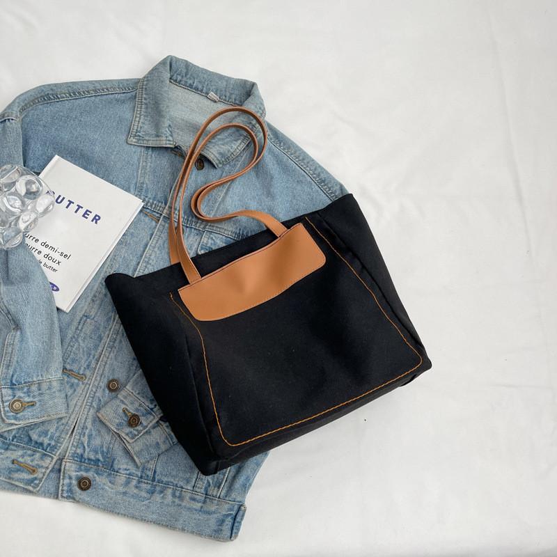 

Fashionable Street Style Canvas Tote Bag With Zipper Closure And Soft Structure Black