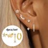 4-teiliges Set Huggie Hoop Ohrringe aus Edelstahl für Damen, Goldfarbe, Einzigartige Zirkonia Blume Ohrstecker Piercing Schmuck