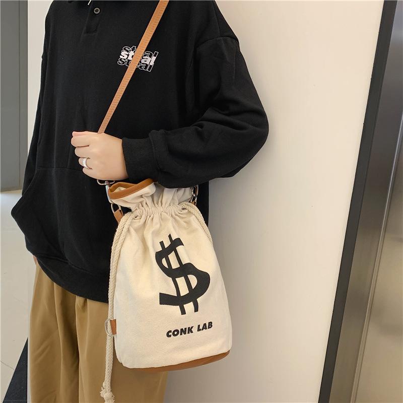 The same canvas bundle bag new trendy 2025 portable storage drawstring single shoulder double shoulder bucket bag fashion