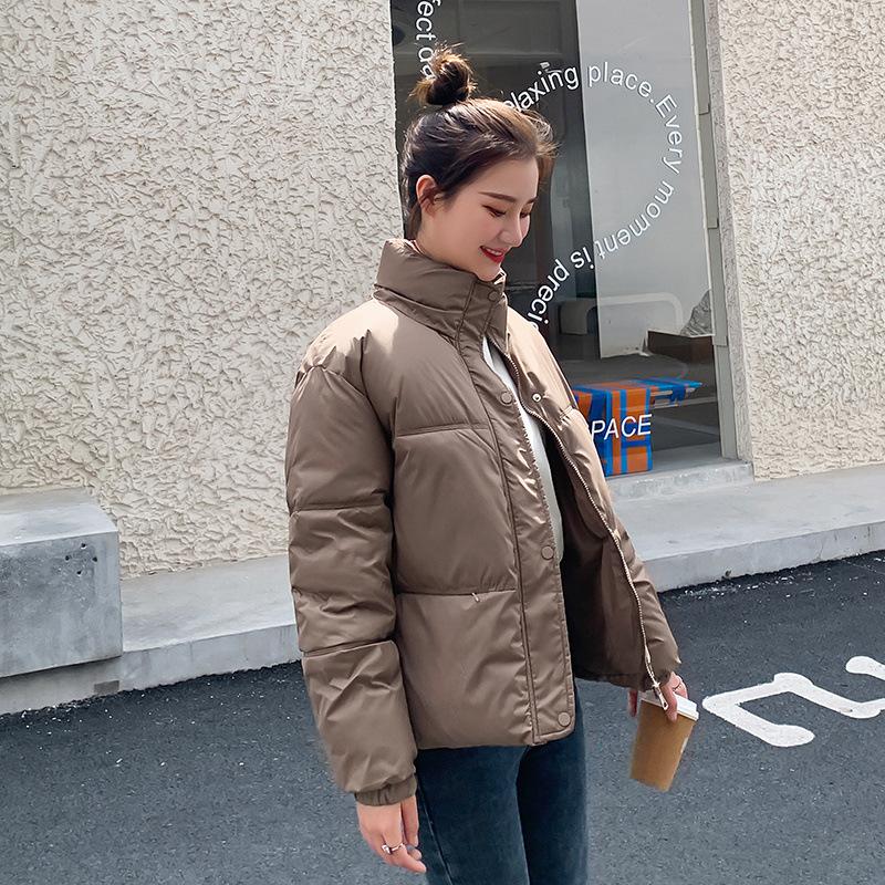 

Жіноча коротка зимова нова вільна корейська бавовняна пухова куртка цукеркового кольору з коміром-стійкою XXL