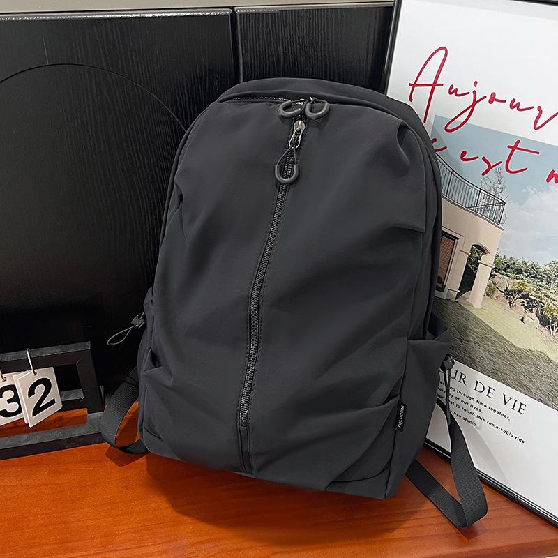 A Trendy and Lightweight Travel Backpack for Middle School Students In A Leisure Campus