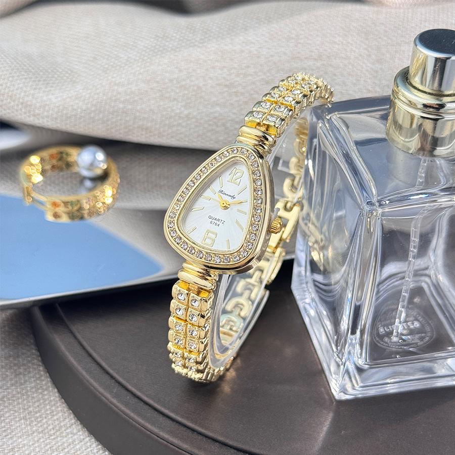 

Women s diamond-set snakehead alloy case Sun stripe stripe scale diamond-set fine bracelet quartz watch luxury women s watch золотий