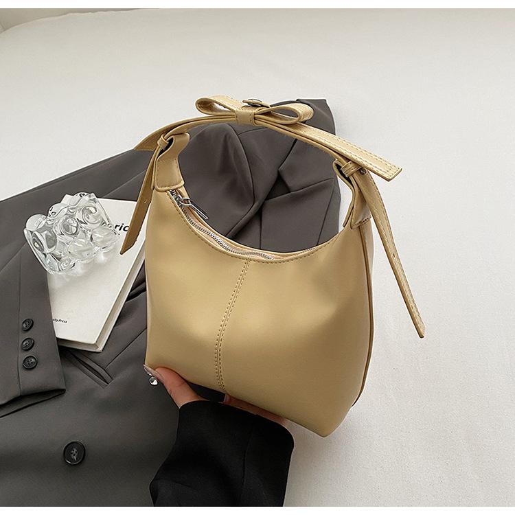 

Высококлассная модная портативная сумка-ведро женская 2025 новая летняя простая повседневная на плечо универсальная сумка-мессенджер женская светло-желтого