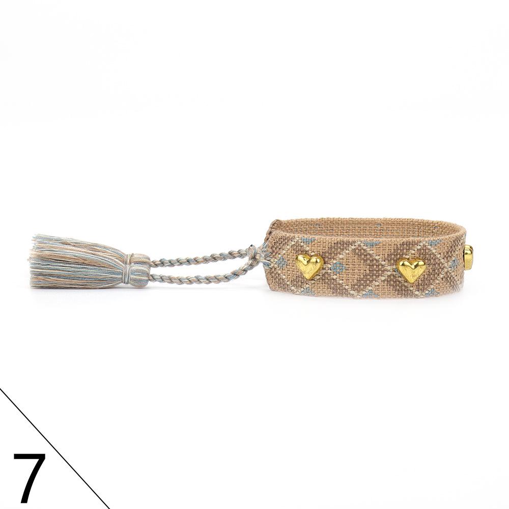 European and American Rivet Metal Heart Tassel Woven Bracelet for Women