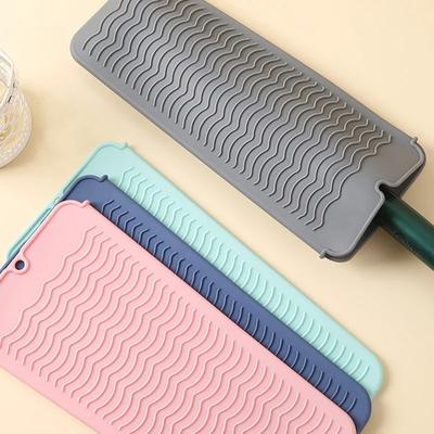 Nástroje na úpravu vlasov – Podložky pod žehličku na vlasy