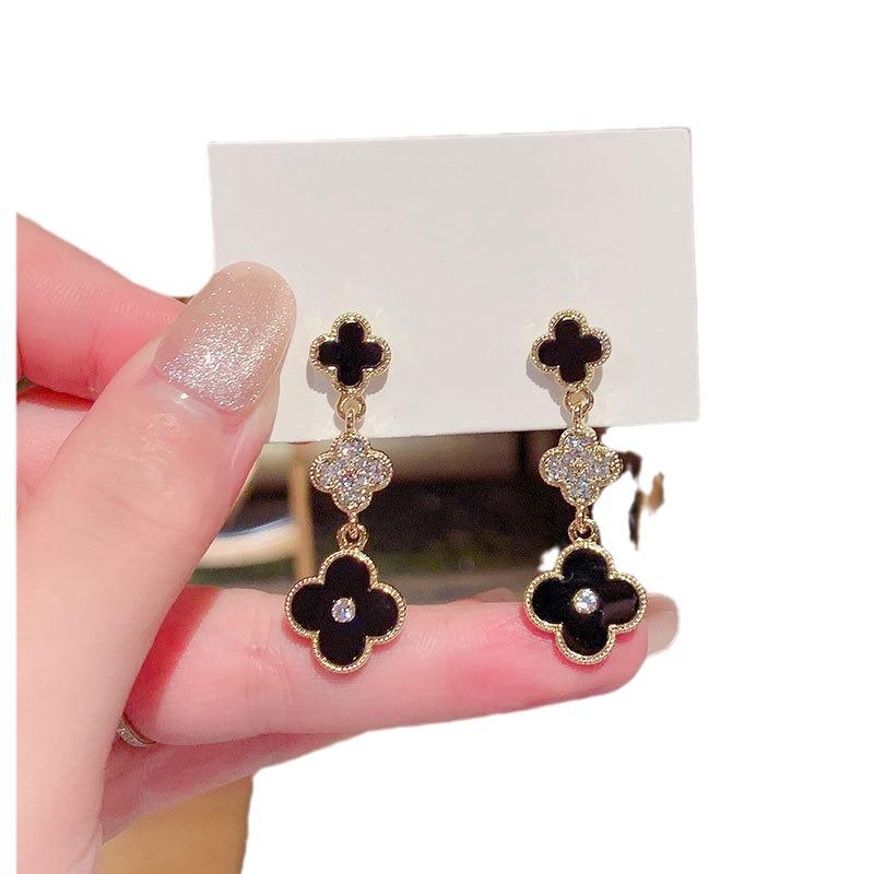 2024 Four-Leaf Clover Silver Needle Earrings: Korean High-End Style, Elegant & Trendy.