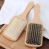 Anti-Static Wooden Paddle Brush for Long Hair Care and Massage, Reducing Hair Loss and Taming Curls with Cushion Design.