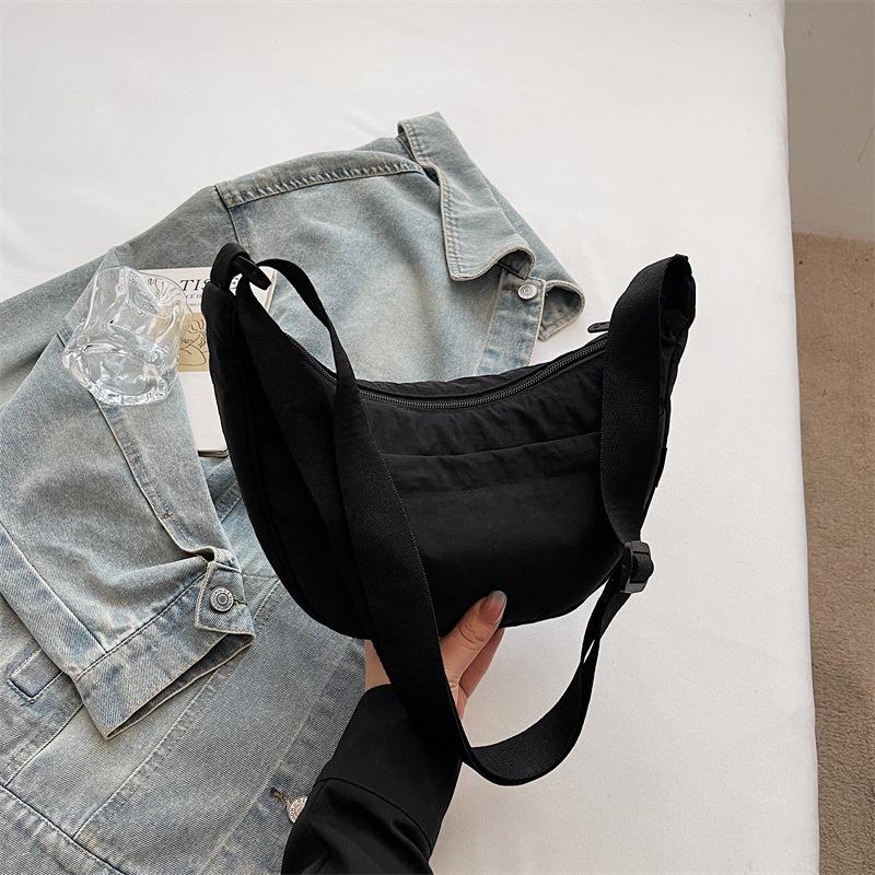 Minimalist Crossbody Bag with Adjustable Strap and Front Zip Pocket Lightweight Everyday Shoulder Bag