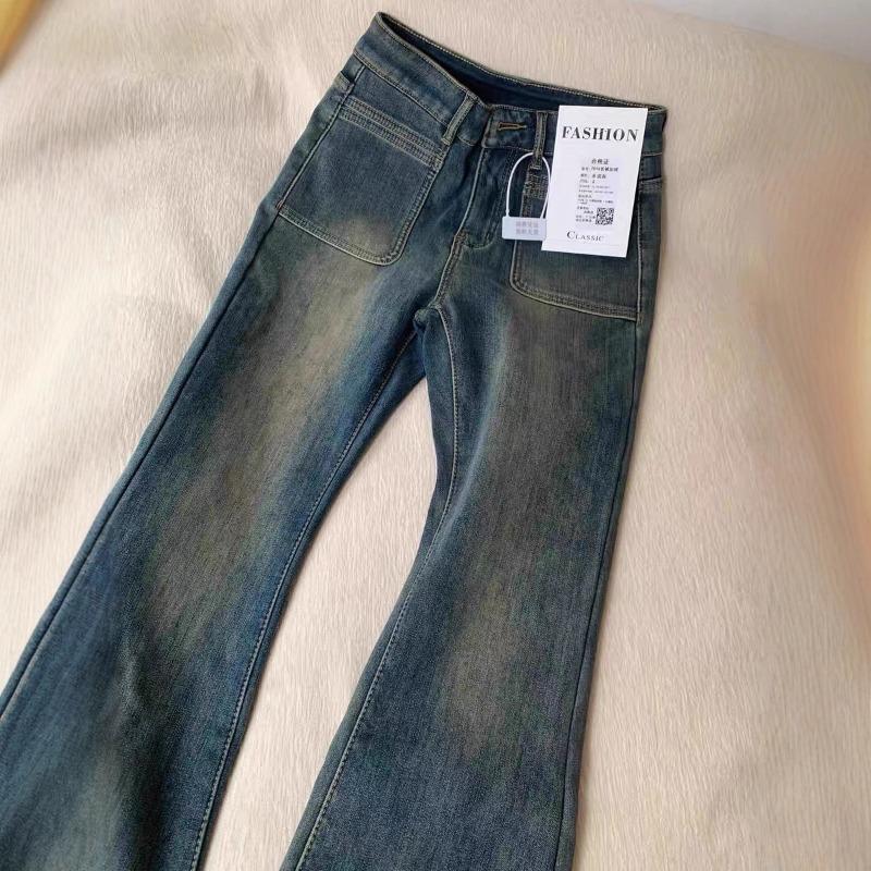Women's slightly pulled jeans are thickened, and the new autumn and winter high-waisted slightly pulled pants are velvet.