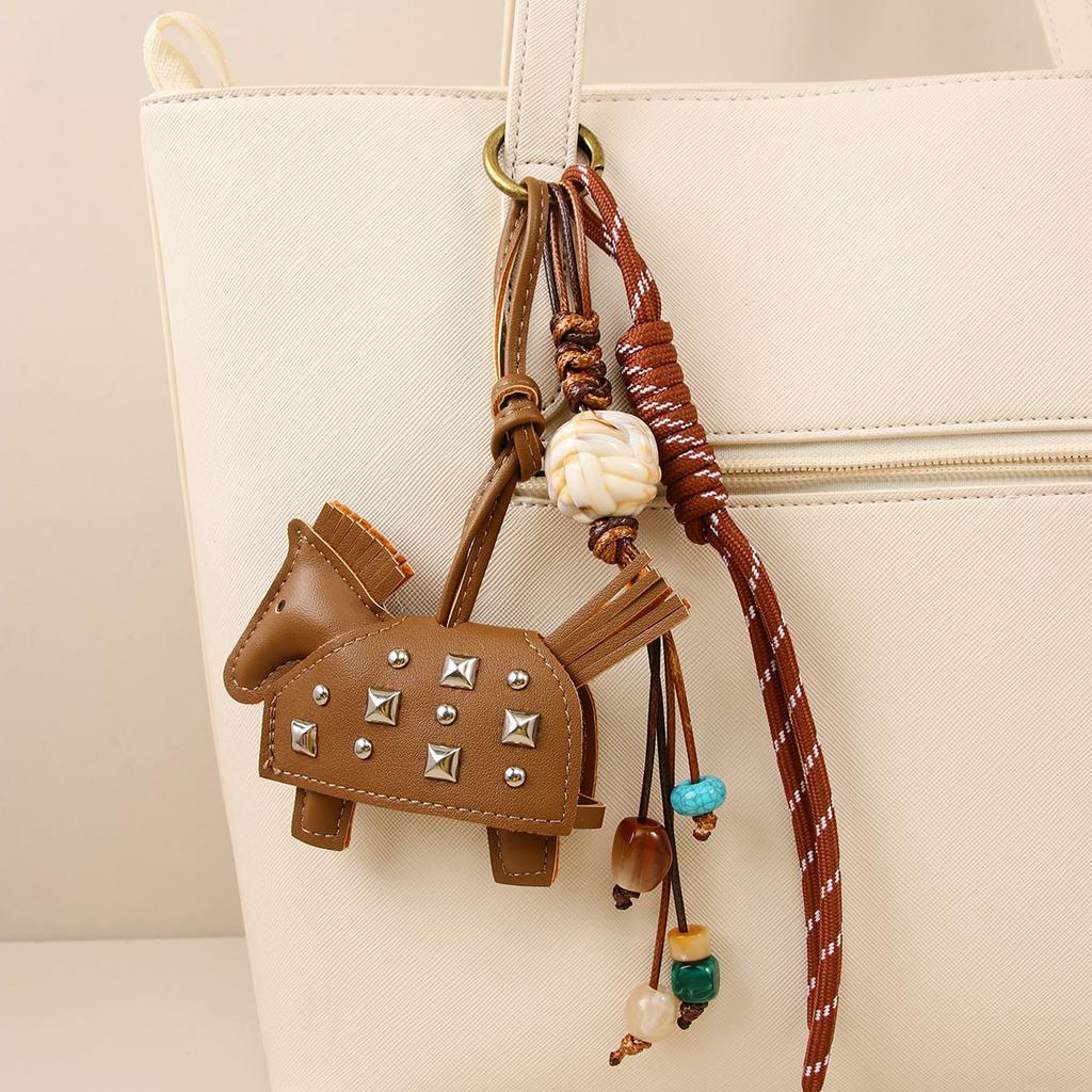 Pony beaded braided rope pendant car pendant key pendant pu leather new rivets war horse bag pendant