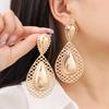 French Retro Niche Design Water Drop Stone and Flower Leaf Dangle Earrings: Luxurious, Exaggerated, Fashionable Ear Ornaments