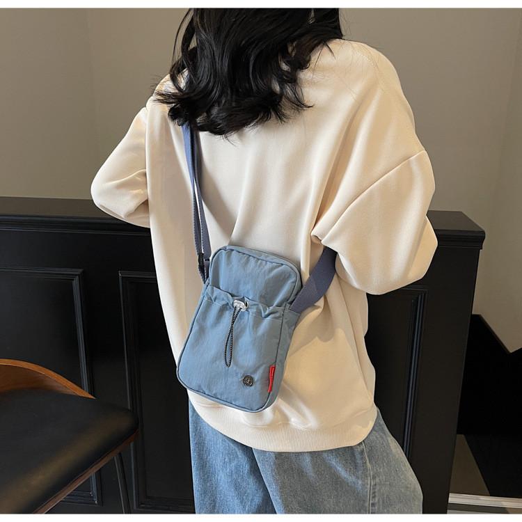 Mini Crossbody Bag For Women With Nylon Material And Zipper Closure For Daily Use