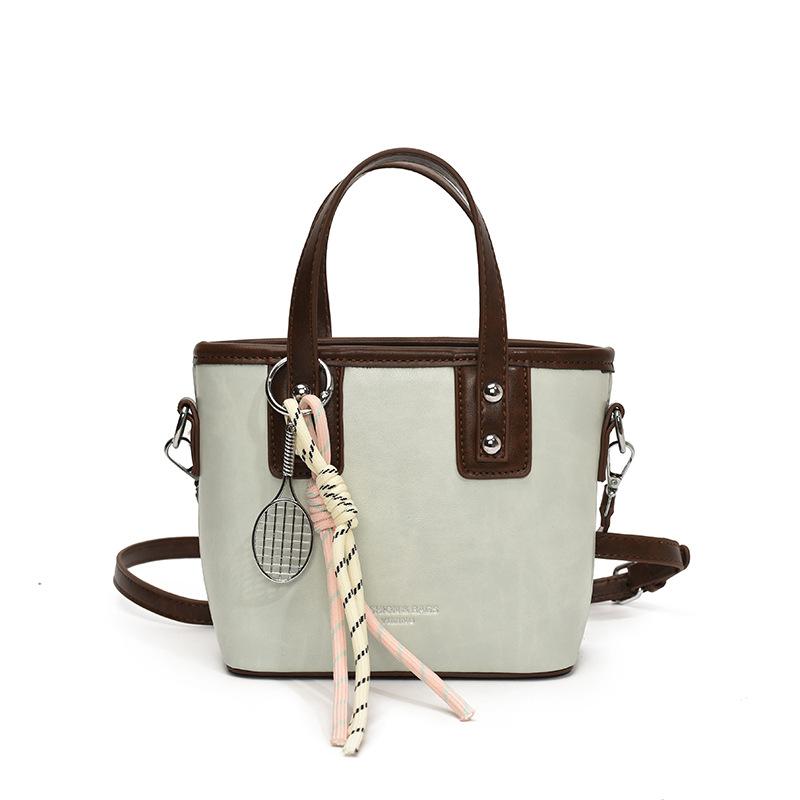 

2025 оптовая продажа новый дизайн простой стиль высокое качество портативная сумка-ведро модная универсальная сумка-мессенджер с контрастными цветами женская светло-зеленый