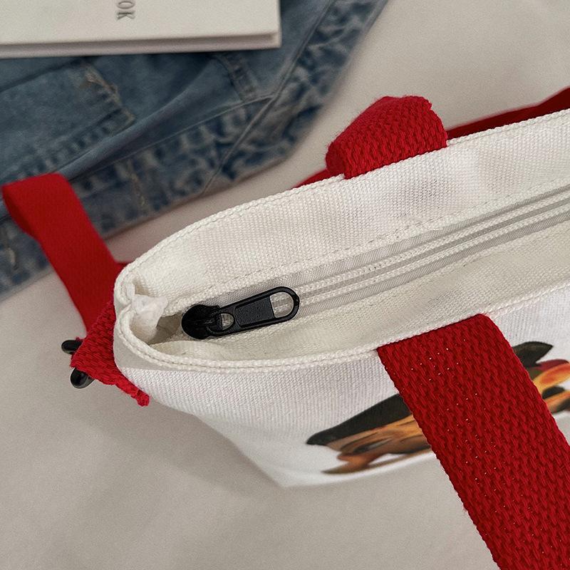 Canvas Bag Double-sided Printed CM * CM Large-capacity Portable Canvas Bag Shoulder Bag Women's Bag