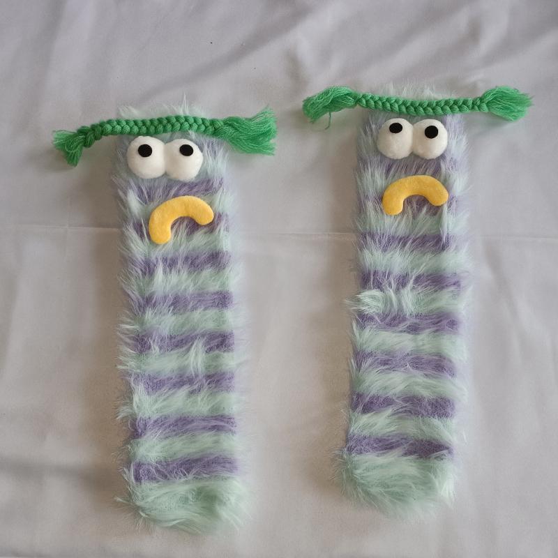 A pair of ugly cute funny socks women's medium tube socks autumn and winter floor sleeping socks coral fleece home hair fluffy c