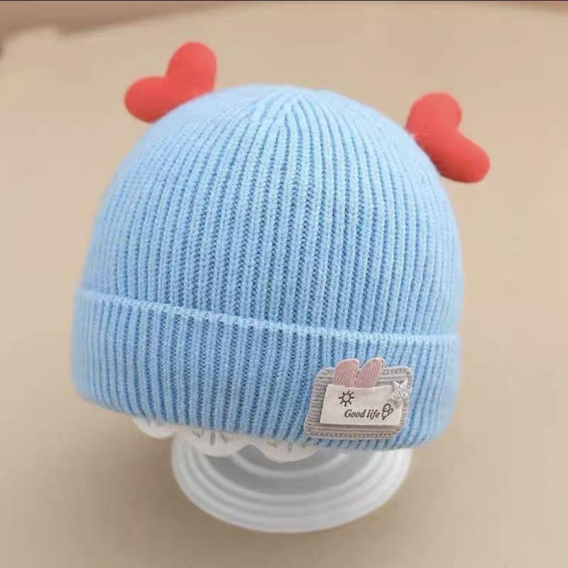 Autumn and winter children's hats baby beige series boys and girls windproof ear protection warm knitted cartoon ear warm