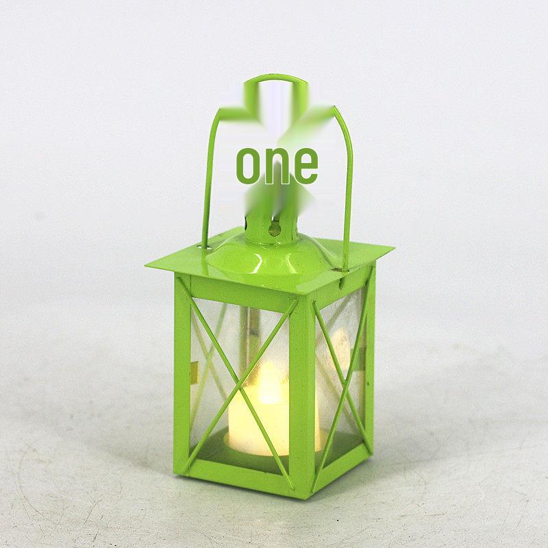 Retro European Windproof Iron Lantern: Mini American-Style Hollow Candle Holder for Home & Courtyard