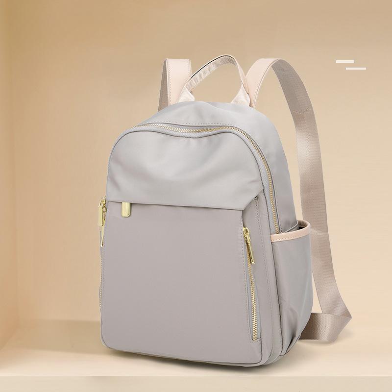 Spring and Summer New Simple and Versatile Large Capacity Lightweight Commuting Oxford Cloth Backpack for Women's Casual Travel Backpack