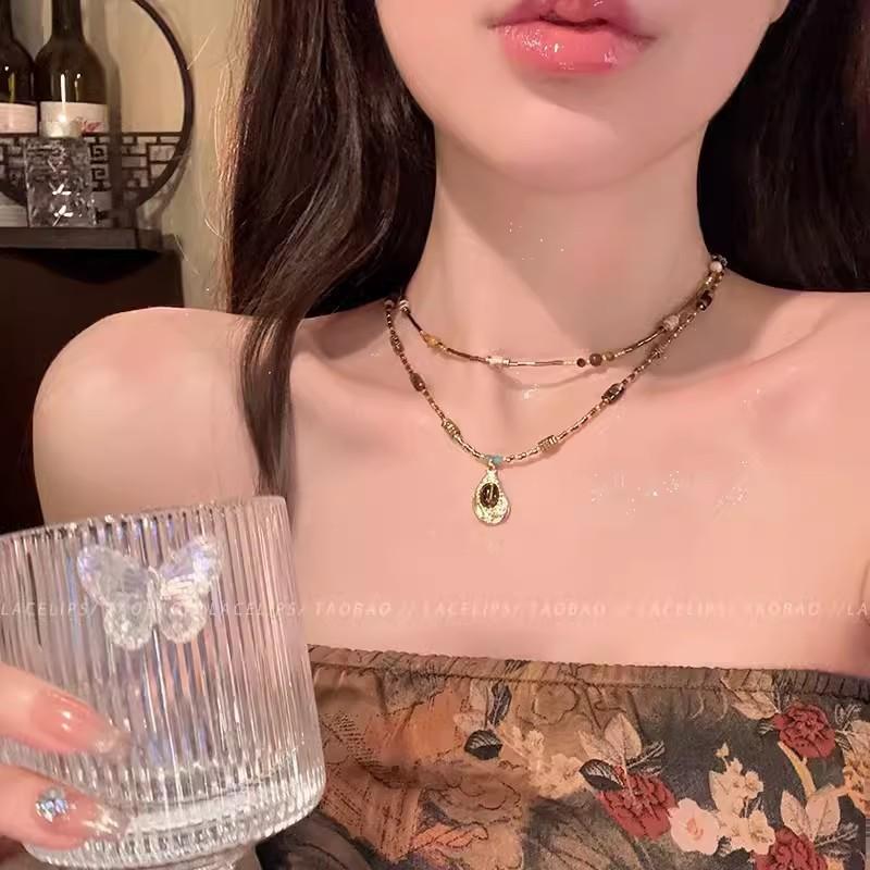 Imitation tiger's eye stone pendant, beaded necklace, personalized sweet and cool collarbone chain, women's high-end sense, retro American