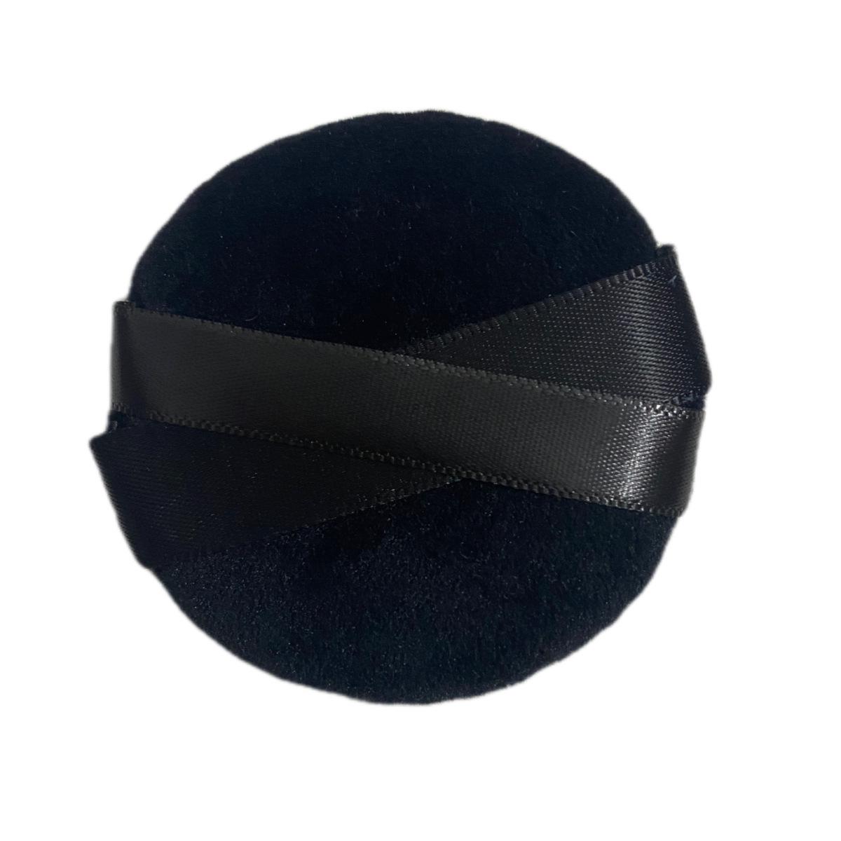 

Round Double-Sided Velour Loose Powder Puff for a Smooth, Non-Cakey Finish.
