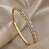 A Luxurious Unisex Cuff Bracelet Inlaid with Artificial Zirconia Gold Hollow Cross Square Bracelet