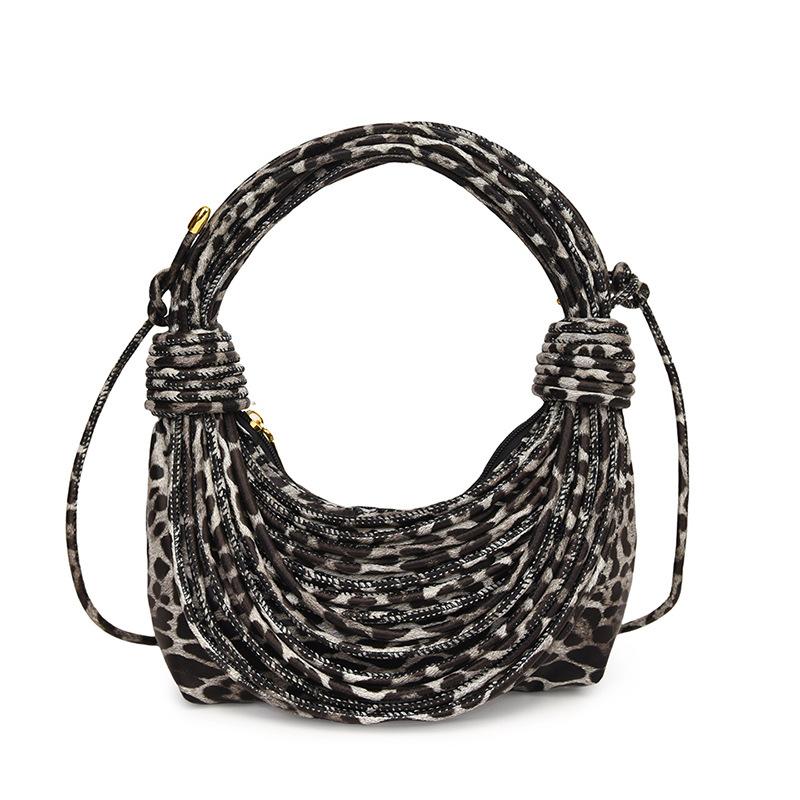 Personalized leopard print bag women's 2025 new European and American fashion niche versatile women's one-shoulder hand-carried noodle woven bag