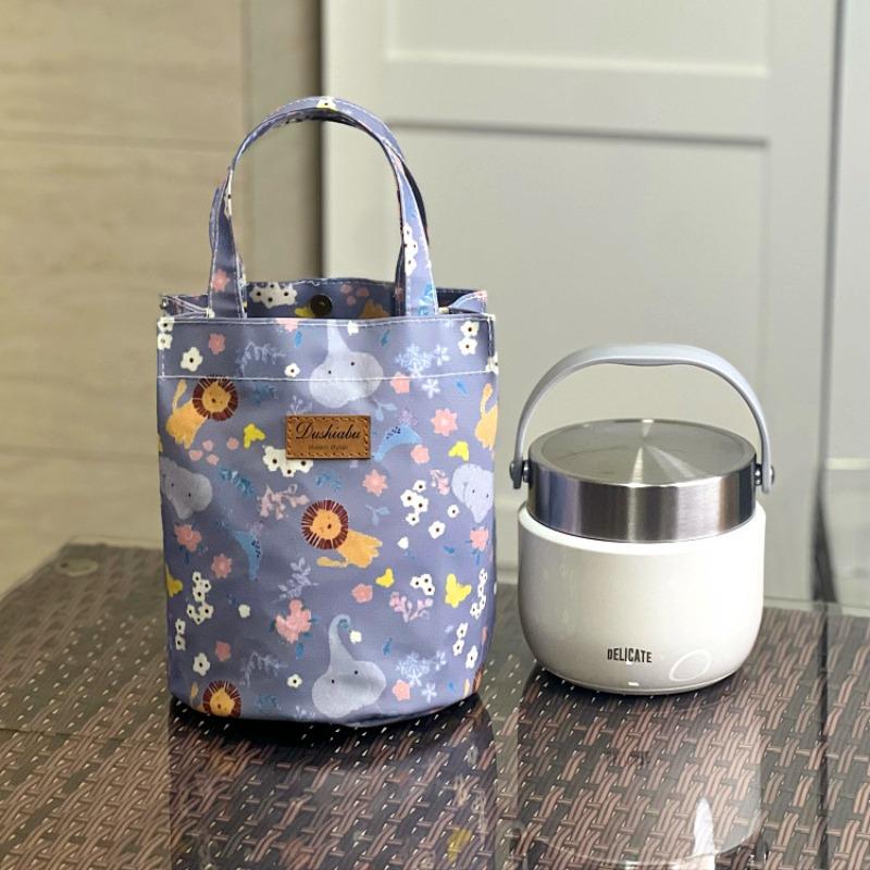 

New waterproof portable cartoon water cup bag, braised cup, thermal insulation bucket, lunch box bag, change key, mobile phone hand bag.