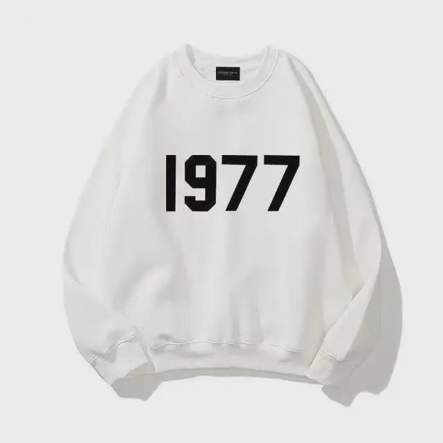 

Vintage 1977 Flocking Velvet ESS Unisex Hoodie - Trendy and Loose Fit for Couples L