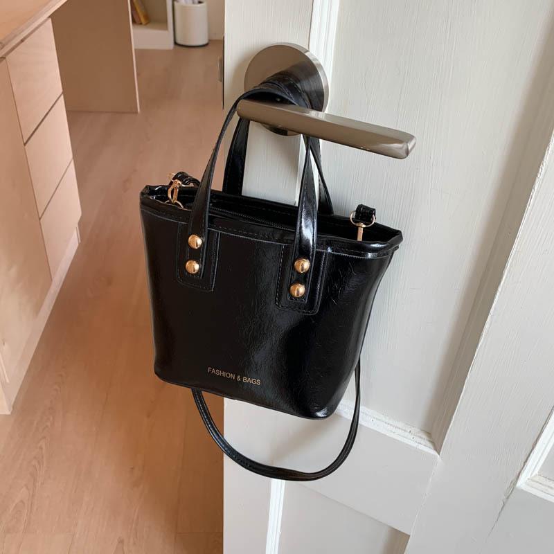 

Премиальная сумка-ведро новый простой популярный красивый повседневный универсальный портативный наплечный мессенджер для женщин чёрный