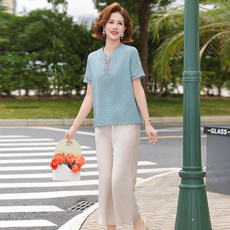 

Stylish Casual Women s Cotton Linen Short Sleeve Summer Top – Comfortable and Loose for Middle-aged and Elderly 5XL синій