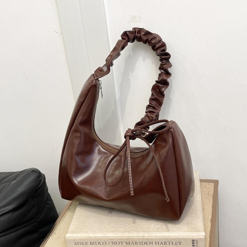 

New large-capacity shoulder armpit bag versatile high-value simple casual fashion saddle bag коричневый